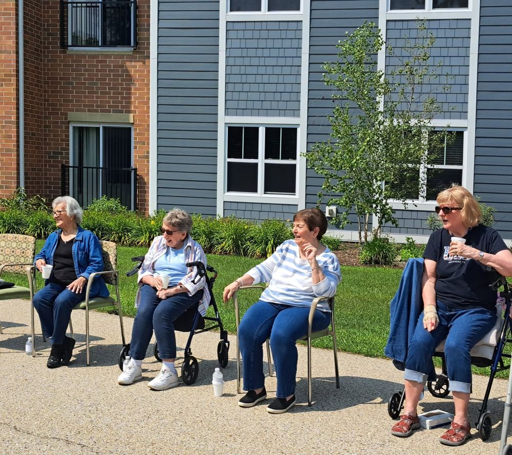 Residents chatting outdoors together