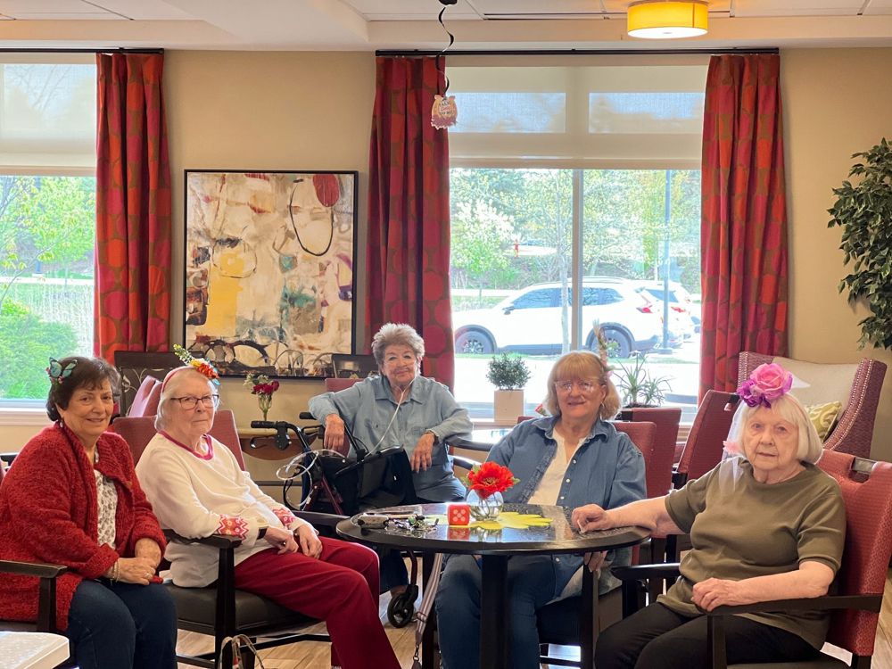 Friends gathered together in the community lounge
