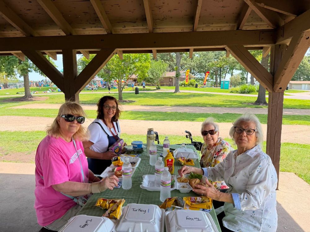 Residents enjoying a picnic outing together