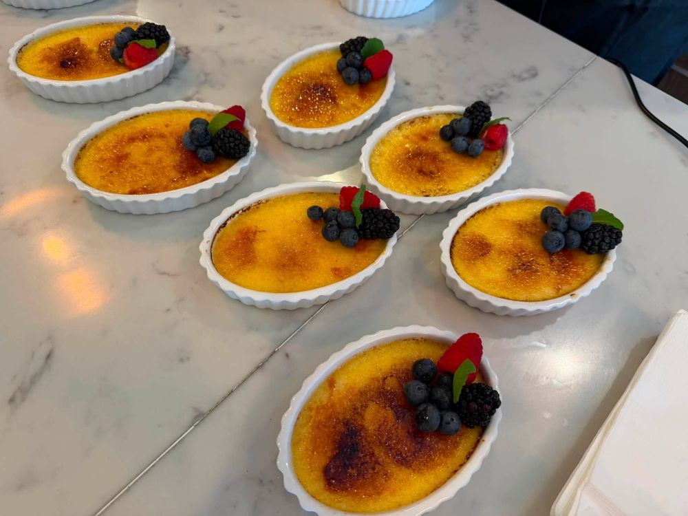 Crème brûlée desserts with fresh berries